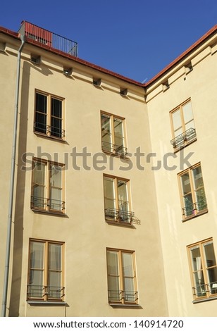 Modern flats in old classic building in sunlight. Stockholm, Sweden.