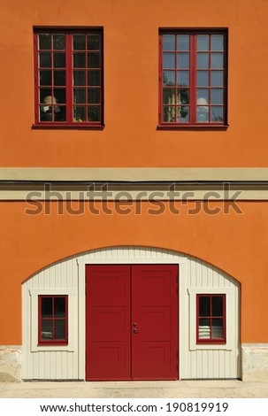 Beautiful red wood door entry on old home.