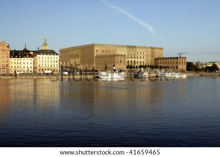 The royal castle in Stockholm, Sweden. Early morning light and reflections in calm water.