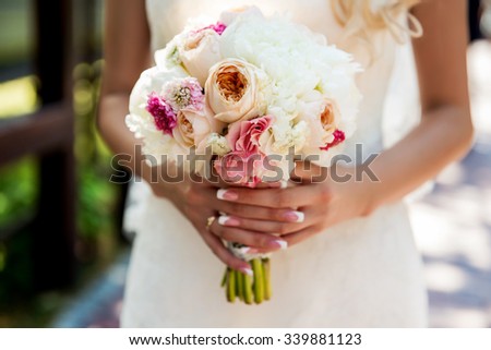 Vintage wedding bouquet in hands woman emotions moment
