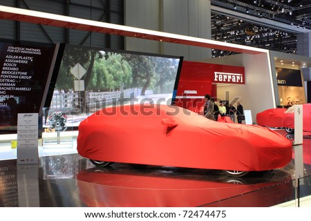GENEVA - MARCH 3 : A Ferrari FF car prepare to show on display at 81th International Motor Show Palexpo-Geneva on March 3, 2010 in Geneva, Switzerland.