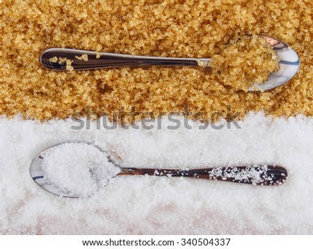 White sugar and brown sugar , and spoon