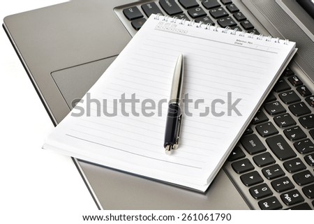Work desk with computer laptop, notebook, pen isolated on white