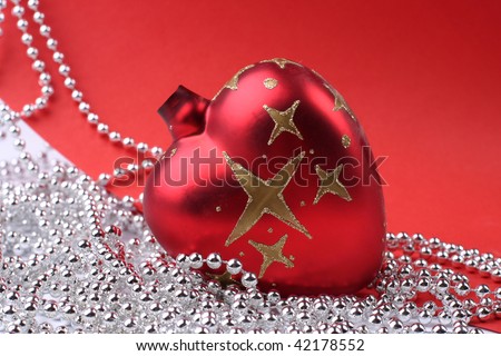 Red Christmas ball on white and red background