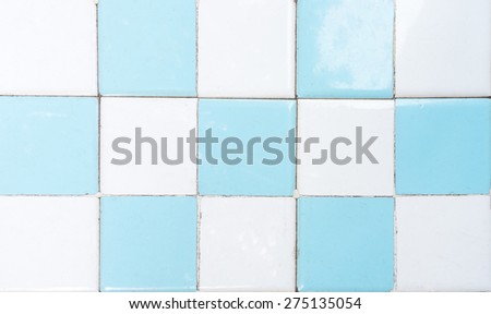 White and Blue Restroom Tile Wall with Chess Pattern