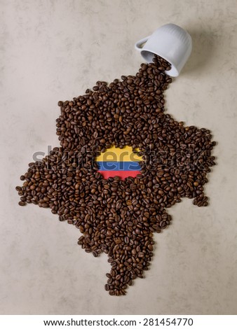 Fall cup coffee, coffee beans forming the map of Colombia
