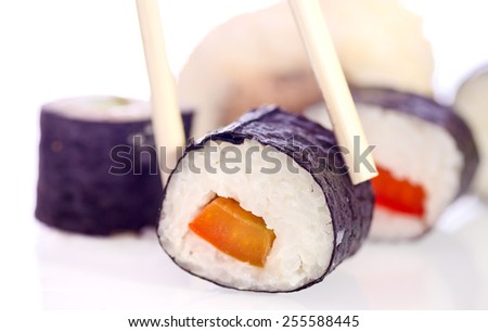Sushi is a Japanese food consisting of cooked vinegared rice combined with other ingredients, seafood, vegetables and sometimes tropical fruits.