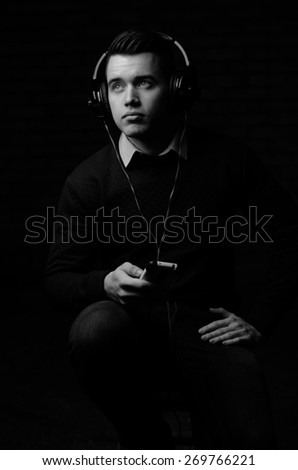 Attractive young male model with headphones