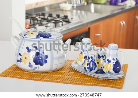 soup with milk jug salt and pepper in kitchen background in kitchen background