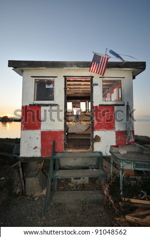 Old shack with a waterfront view.