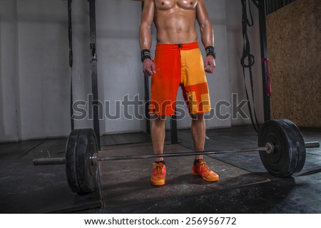 Athlete preparing for training at the gym.