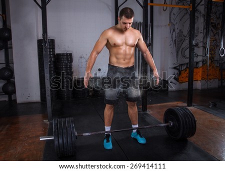 Athlete preparing for training at the gym.