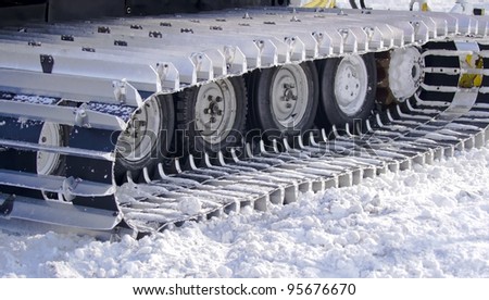 snow-clearing equipment on a snowy background