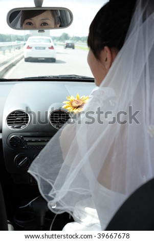 Bride drives sport car
