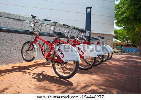 BARCELONA, SPAIN - AUG 5: Rental bikes port on August 5, 2013 in Barcelona, Spain. Number of tourists visiting Barcelona is more than 7 million. It is world\'s 4th most visited tourist destination