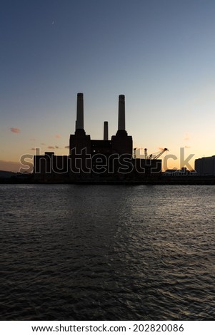 Silhouette of Battersea Power Station viewed from the bank of the Thames. Power Station is being redeveloped by an international consortium.