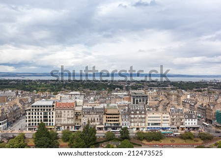 EDINBURGH, SCOTLAND: AUGUST 3, 2014: Panoramic view on city from Edinburgh Castle. Castle is most popular tourist attraction in Scotland.