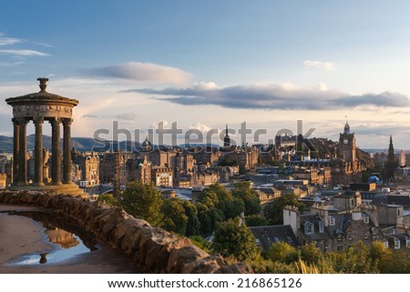 Dugald Stewart monument at Calton Hill with Edinburgh (Scotland) in background. Calton Hill is popular hill in central Edinburgh included in UNESCO World Heritage Site list.