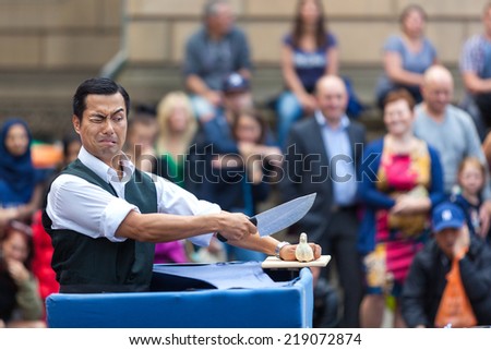 EDINBURGH, SCOTLAND: AUGUST 8, 2014: Artist performing on Fringe festival. Fringe is the very popular and largest arts festival in the world.