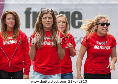 EDINBURGH, SCOTLAND: AUGUST 8, 2014: Singers performing on Fringe festival. Fringe is the very popular and largest arts festival in the world.