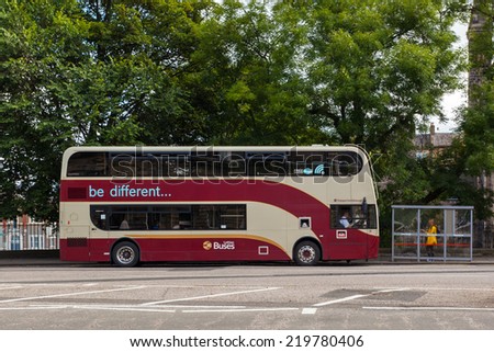 EDINBURGH, SCOTLAND: AUGUST 3, 2014: Edinburgh Lothian double-decker bus on station.