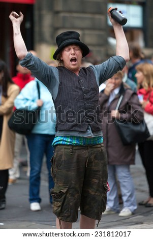 EDINBURGH, SCOTLAND: AUGUST 3, 2014: Artist performing on Fringe festival. Fringe is the very popular and largest arts festival in the world.
