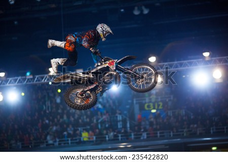 ZAGREB, CROATIA - MARCH 30, 2013: FMX motorbike driver performing on Masters of dirt 2013 - Freestyle motocross show.