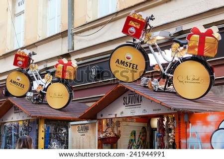 ZAGREB, CROATIA - DECEMBER 26, 2014: Decorative Amstel bicycles roofs of Christmas stands in Tomiceva street placed there during program Fuliranje.