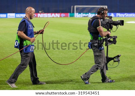 ZAGREB, CROATIA - SEPTEMBER 16, 2015: UEFA Champions League 2015-16 Group F - GNK Dinamo Zagreb VS FC Arsenal.TV crew at the pitch