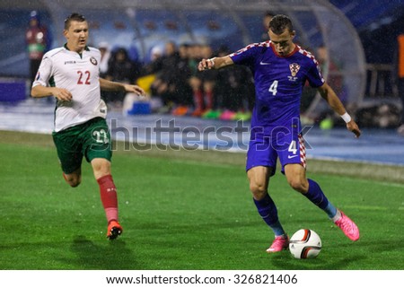 ZAGREB, CROATIA - OCTOBER 10, 2015: EURO 2016 qualifiers, group H - Croatia VS Bulgaria. Todor NEDELEV (22) and Ivan PERISIC (4)