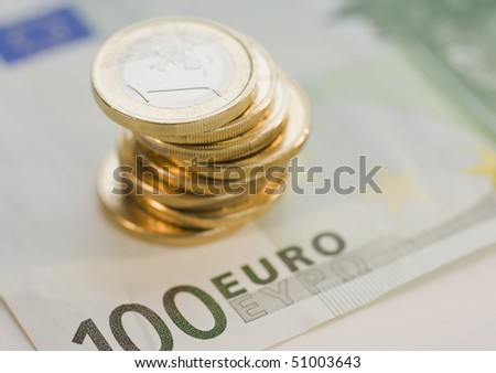 stack of coin euros on paper euro