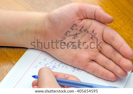 cheat sheet written in the hand a schoolboy