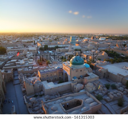 Top view of the city of Khiva at sunset. Blurred image with sharp center- tilt shift lens effect