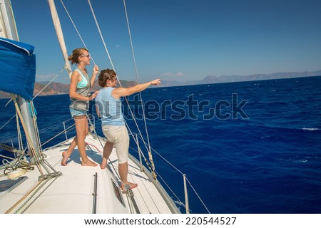 Young couple sailing in a sea