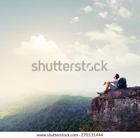 Hiker relaxing on the rock