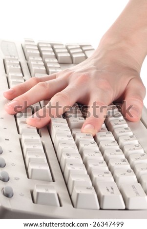 Hand on PC keyboard