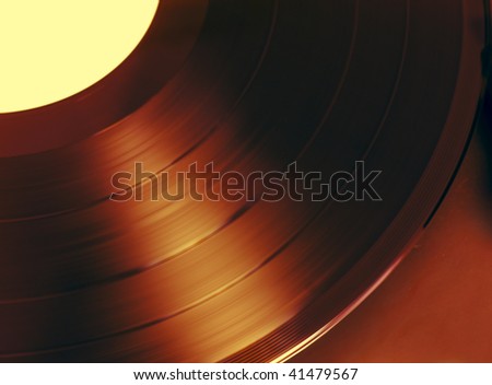 Rotating retro vinyl disc