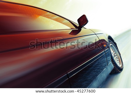Car in motion on road