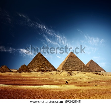 Giza valley with Great pyramids and blue sky with clouds