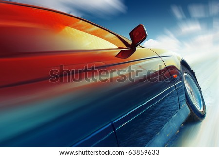 Blurred car on icy road with sky
