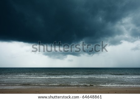 Stormy rain clouds over sea
