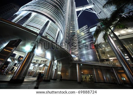 KUALA LUMPUR - NOVEMBER 04: Part of the Petronas Twin Towers - tallest twin buildings in the world at the night November 04, Kuala Lumpur, Malaysia