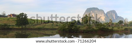 Mountains green hills with trees and river. Thailand. Krabi province