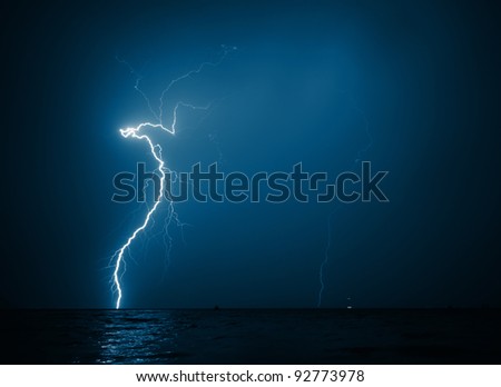 Flash in a dark stormy sky