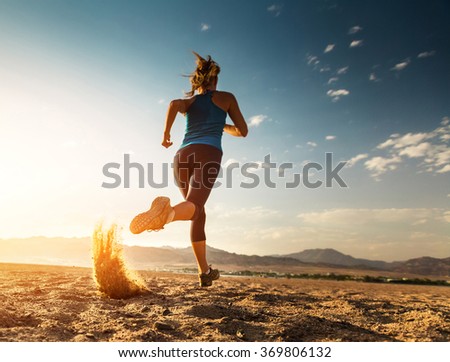Lady running in the desert