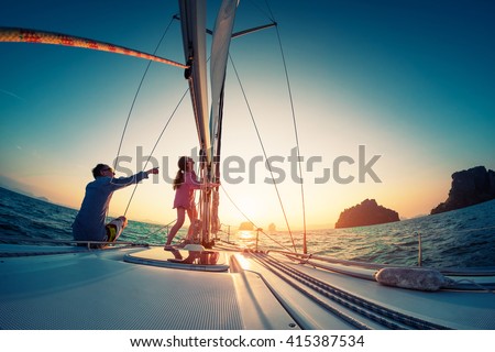 Couple sailing in the tropical sea