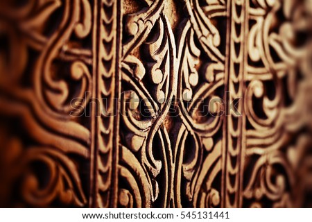 Oriental texture on a wood. Door in one of Uzbekistans\' mosque