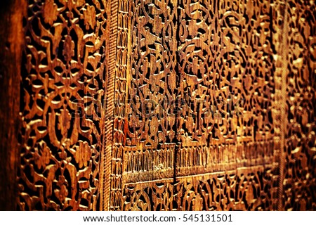 Oriental texture on a wood. Door in one of Uzbekistans\' mosque