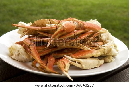 Large serving tray filled with crab legs