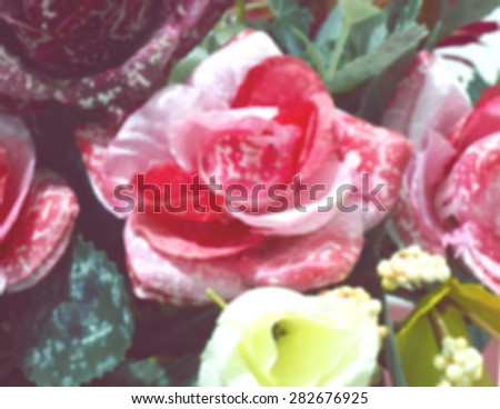 Fake flowers or artificial flowers blur style for background